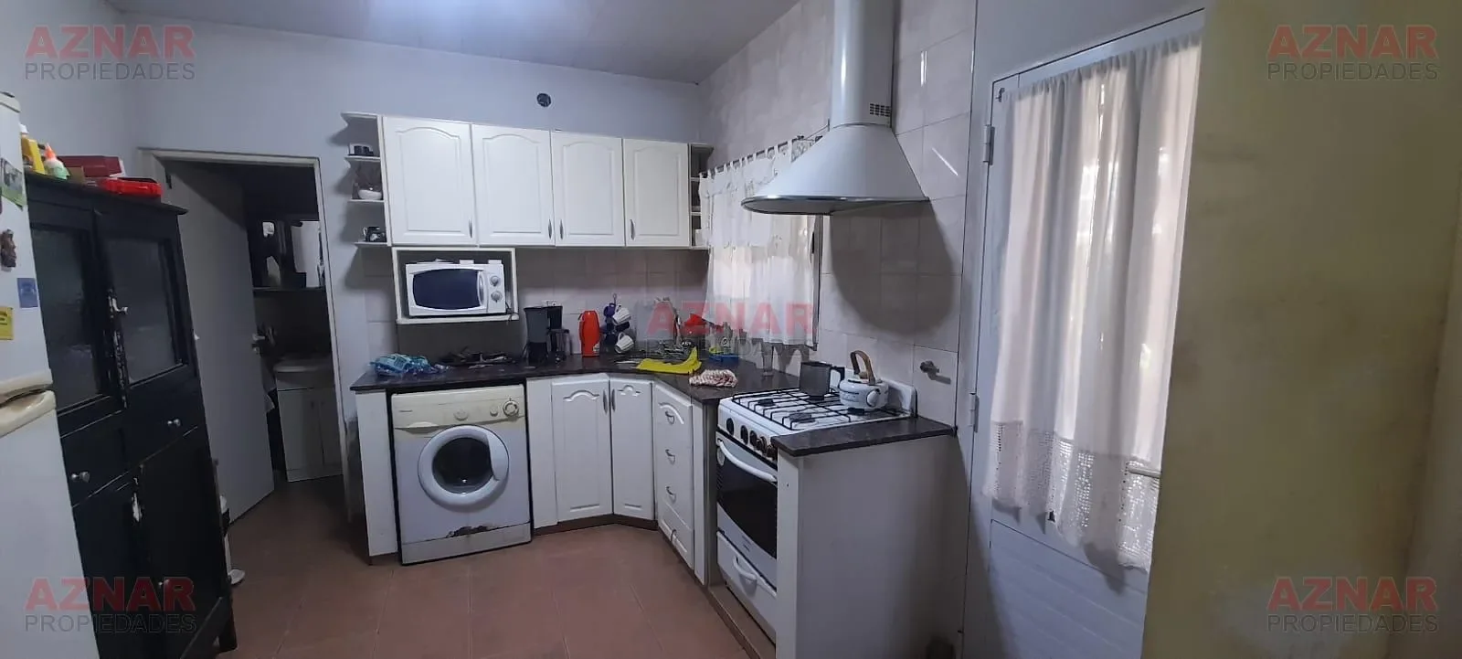Casa con Local en venta en Gral. Paz Nº 1665