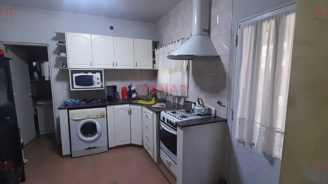 Casa con Local en venta en Gral. Paz Nº 1665