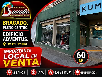 BRAGADO - VENTA - LOCAL COMERCIAL SOBRE AV. PELLEGRINI. EDIFICIO ADVENTUS I- 60 M2 . T/L/SERVICIOS. 2 BAÑOS, ESTUFA, A/A. CONSTRUCCION AÑO 2015. U$S. 70.000.-